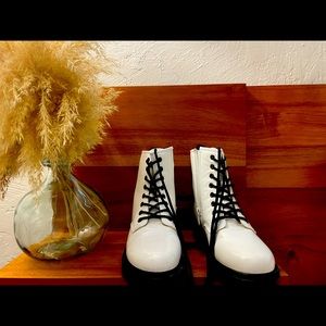 Never worn Krush women’s combat boots. Euro 5, but fits like a women’s size 8.